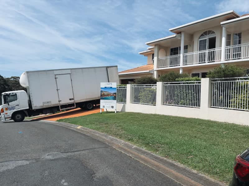 Moving Truck in Front of A Residential House