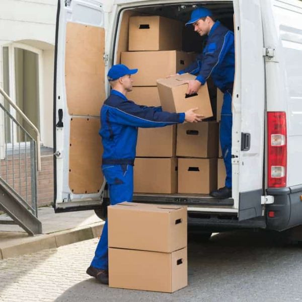 Delivery Men Unloading Boxes — Removals & General Freight in Port Macquarie, NSW
