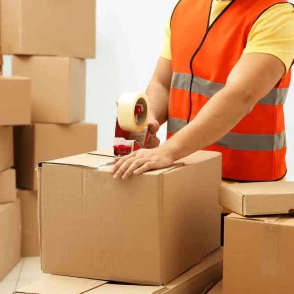 Packing Boxes With Sticky Tape — Removals & General Freight in Port Macquarie, NSW